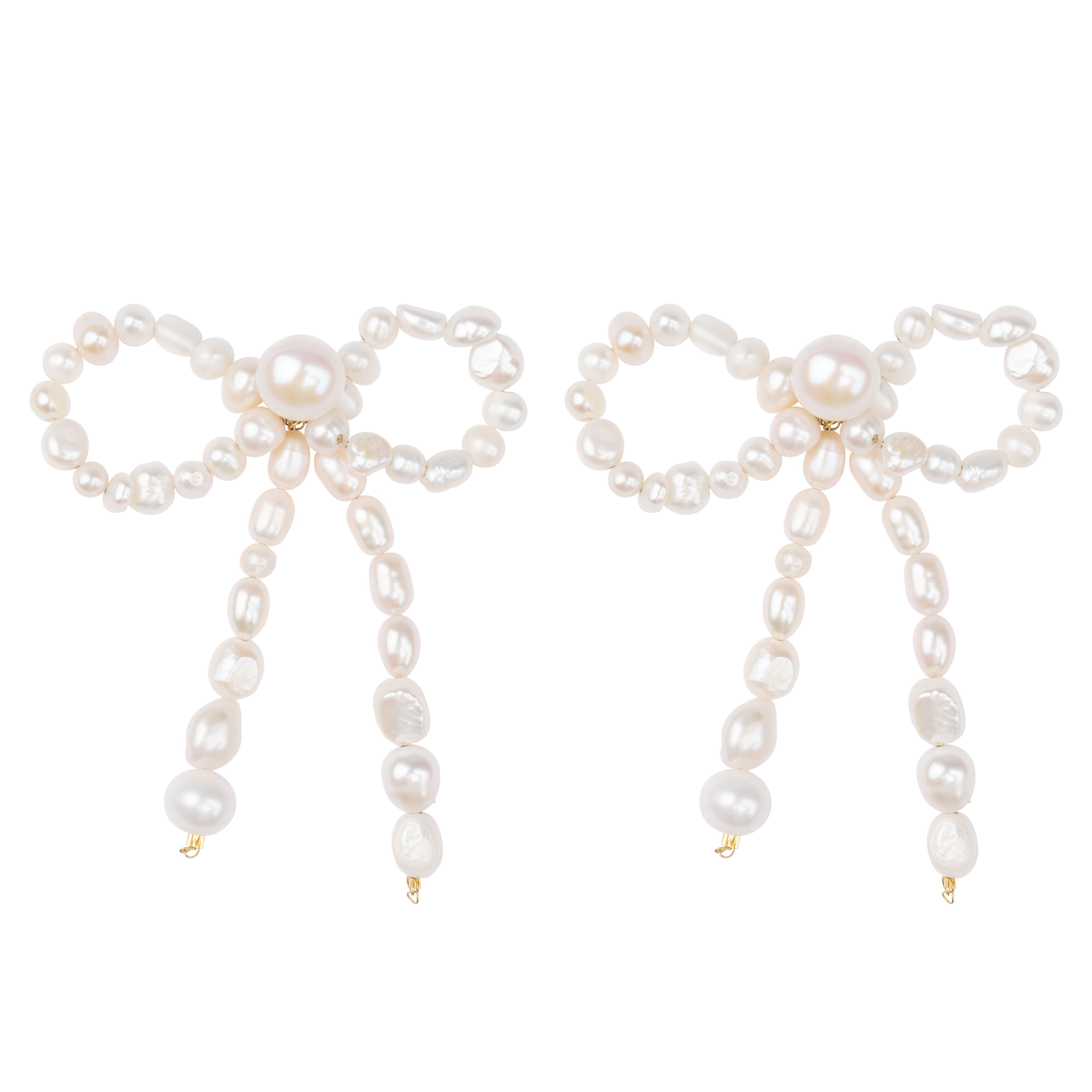 Pearl Bow Earrings🐚✨ This suggests a bow adorned or associated with pearls  and possibly believed to possess protective or magical… | Instagram